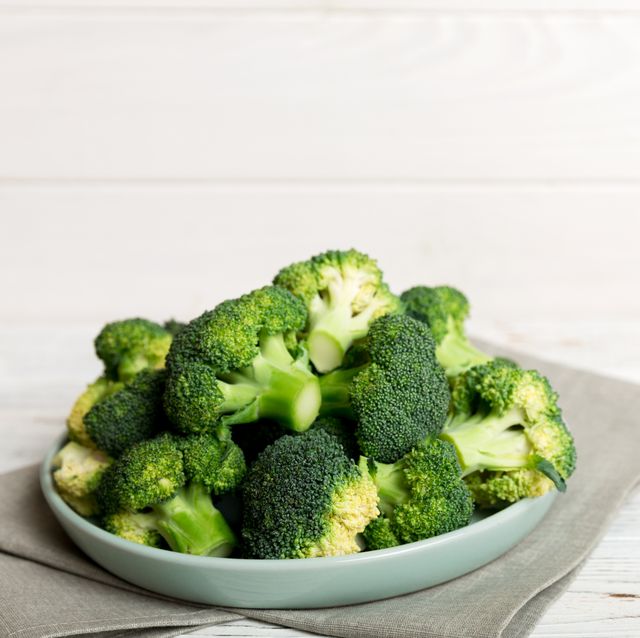 broccoli of fresh green broccoli in bowl over coloredbackground , close up fresh vegetable