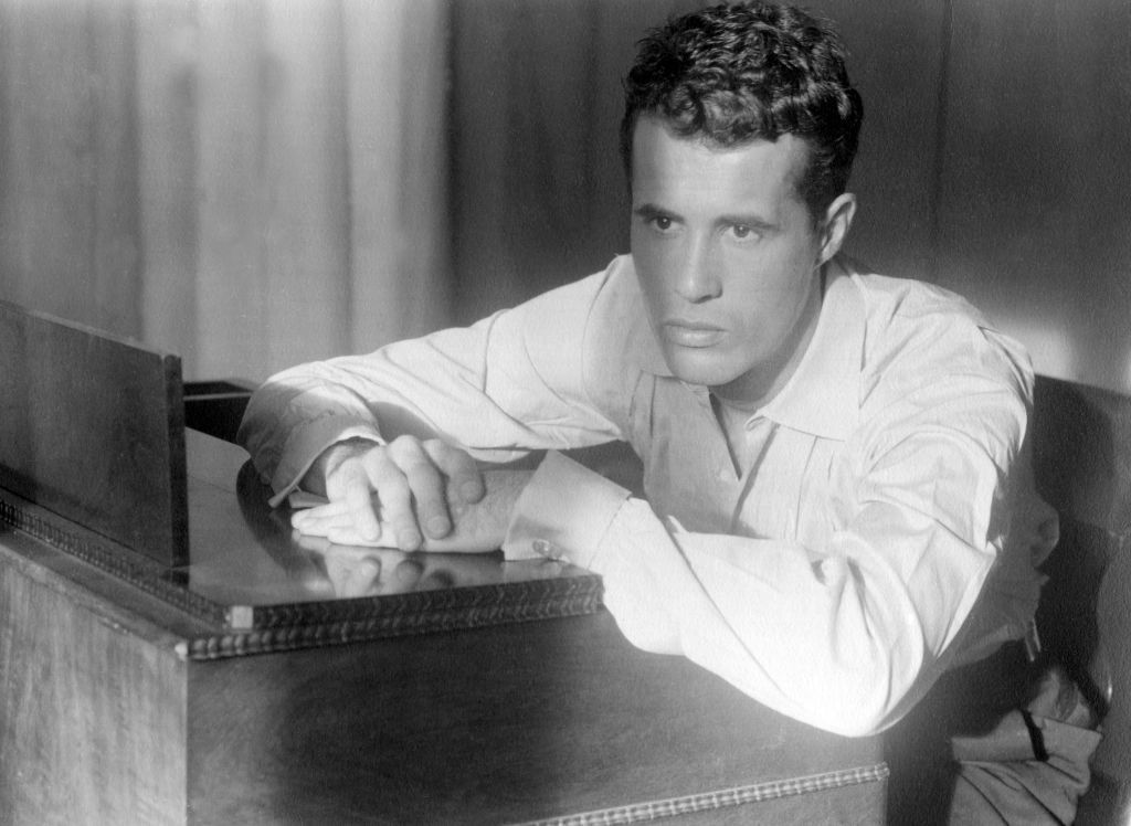 portrait of american film director kenneth anger born kenneth anglemyer as he poses, seated at a piano, los angeles, california, 1955 photo by estate of edmund teskegetty images