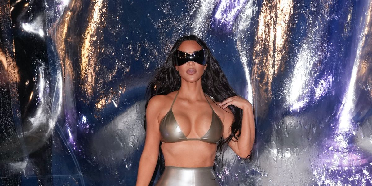 Kim Kardashian Wore a Silver Bikini Top & Leggings to SKIMS Event