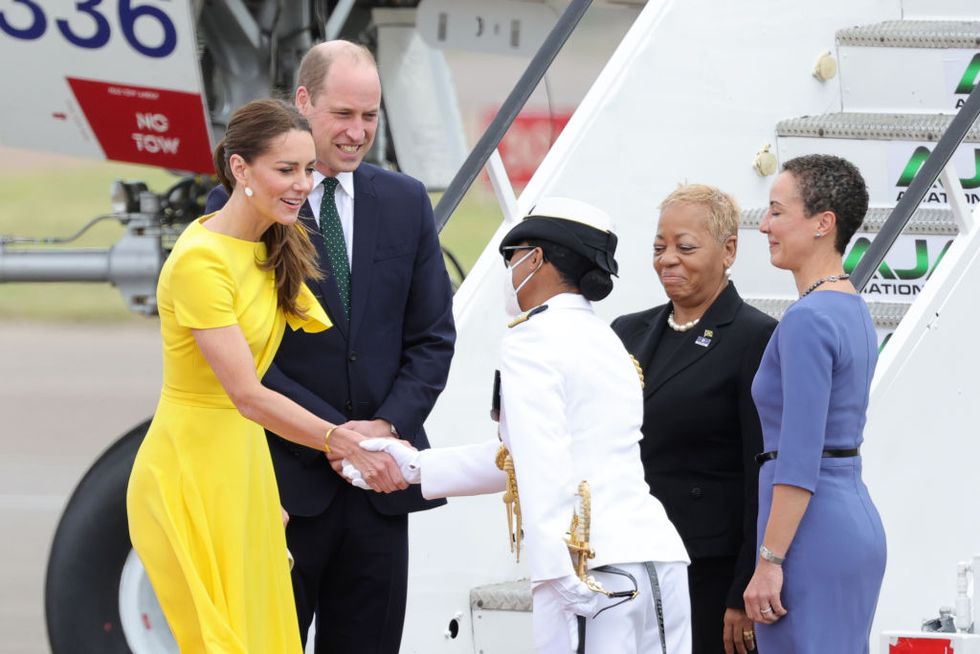 kingston, jamaica   march 22 catherine, duchess of cambridge and prince william, duke of cambridge during the official arrival at norman manley international airport on march 22, 2022 in kingston, jamaica the duke and duchess of cambridge are visiting belize, jamaica and the bahamas on behalf of her majesty the queen on the occasion of the platinum jubilee the 8 day tour takes place between saturday 19th march and saturday 26th march and is their first joint official overseas tour since the onset of covid 19 in 2020 photo by chris jacksongetty images