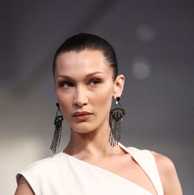 new york, new york   march 22 bella hadid, jewelry detail, walks the runway at the ralph lauren fall 2022 fashion show at the museum of modern art on march 22, 2022 in new york city photo by arturo holmesgetty images