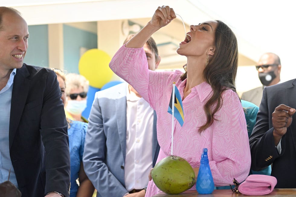 great abaco, bahamas   march 26 prince william, duke of cambridge watches as catherine, duchess of cambridge tries conch salad during their visit to a fish fry – a quintessentially bahamian culinary gathering place which is found on every island in the bahamas on march 26, 2022 in great abaco, bahamas abaco was dramatically hit by hurricane dorian which saw winds of up to 185mph and left devastation in its wake their royal highnesses are learning about the impact of the hurricane and see how communities are still being rebuilt more than two years on photo by samir hussein   poolwireimage