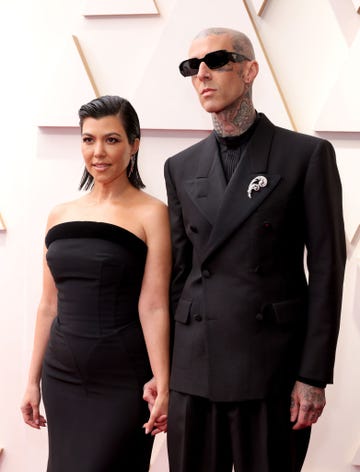 hollywood, california   march 27 l r kourtney kardashian and travis barker attend the 94th annual academy awards at hollywood and highland on march 27, 2022 in hollywood, california photo by momodu mansaraygetty images