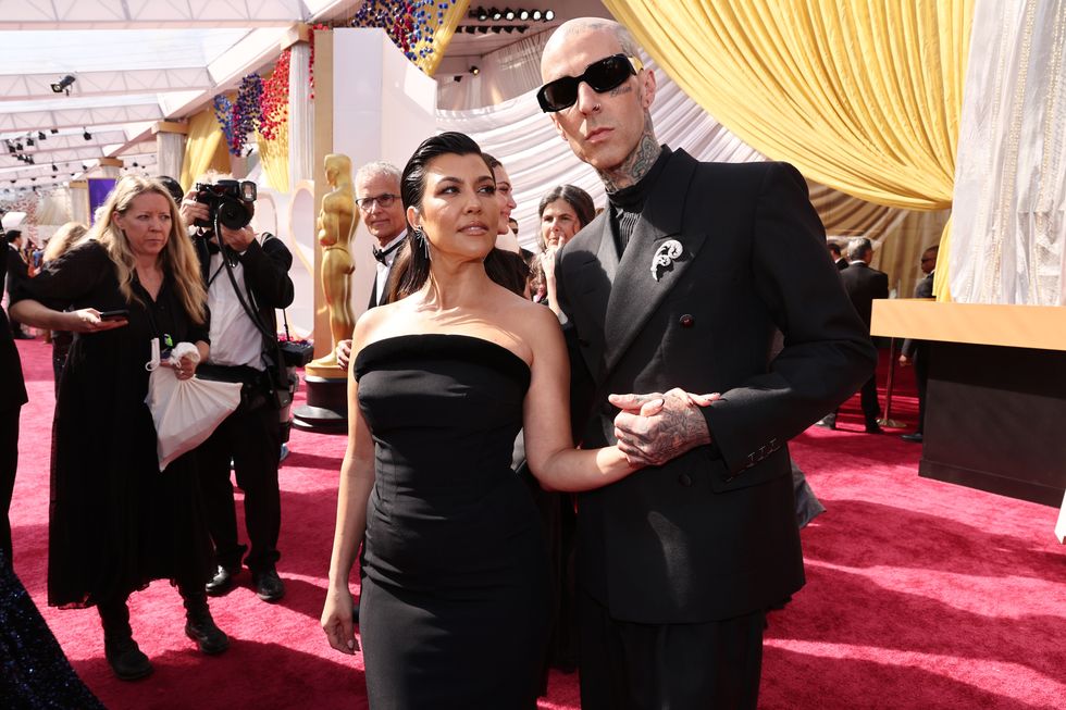 hollywood, california   march 27 l r kourtney kardashian and travis barker attend the 94th annual academy awards at hollywood and highland on march 27, 2022 in hollywood, california photo by emma mcintyregetty images