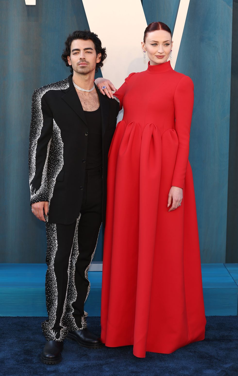 Sophie Turner Sparkles in Sheer Dress at Vanity Fair Oscars Party