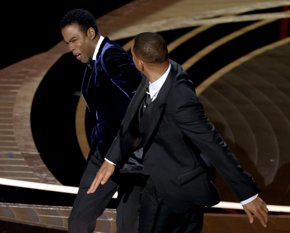 hollywood, california   march 27 l r chris rock and will smith are seen onstage during the 94th annual academy awards at dolby theatre on march 27, 2022 in hollywood, california photo by neilson barnardgetty images