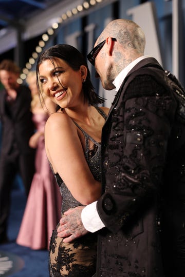 kourtney kardashian and travis barker at the vanity fair oscars after party