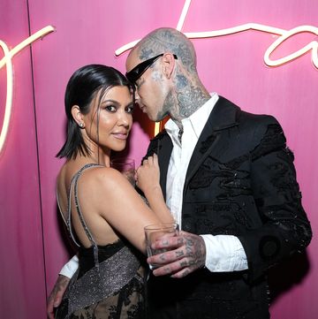 beverly hills, california march 27 kourtney kardashian and travis barker attend the 2022 vanity fair oscar party hosted by radhika jones at wallis annenberg center for the performing arts on march 27, 2022 in beverly hills, california photo by kevin mazurvf22wireimage for vanity fair