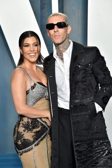 beverly hills, california   march 27 kourtney kardashian and travis barker attend the 2022 vanity fair oscar party hosted by radhika jones at wallis annenberg center for the performing arts on march 27, 2022 in beverly hills, california photo by lionel hahngetty images