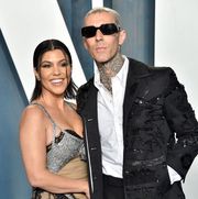 beverly hills, california   march 27 kourtney kardashian and travis barker attend the 2022 vanity fair oscar party hosted by radhika jones at wallis annenberg center for the performing arts on march 27, 2022 in beverly hills, california photo by lionel hahngetty images