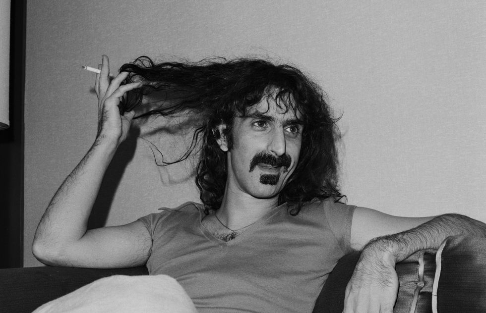 view of american rock, jazz, and experimental musician frank zappa 1940 1993 in a hotel room, san francisco, california, december 1975 photo by janet friesgetty images