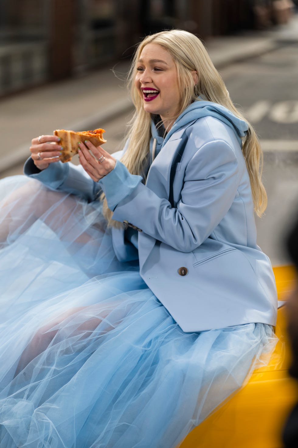 See Gigi Hadid Eat Pizza in a Princess Gown at an NYC Photo Shoot