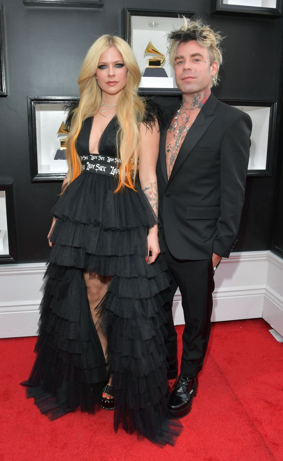 las vegas, nevada april 03 l r avril lavigne and mod sun attend the 64th annual grammy awards at mgm grand garden arena on april 03, 2022 in las vegas, nevada photo by lester cohengetty images for the recording academy