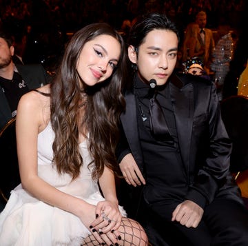 las vegas, nevada   april 03 l r olivia rodrigo and v of bts attend the 64th annual grammy awards at mgm grand garden arena on april 03, 2022 in las vegas, nevada photo by emma mcintyregetty images for the recording academy