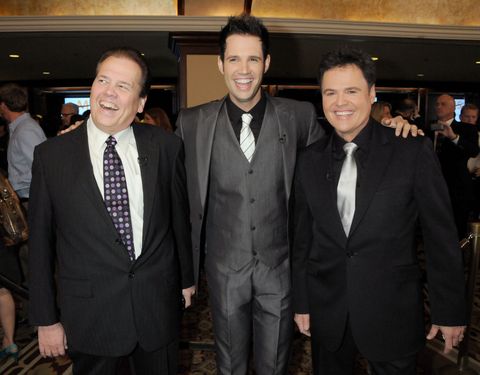 los angeles, ca   september 27 alan osmond, son david osmond and brother donny osmond arrive at the 36th annual dinner of champions at the hyatt regency century plaza hotel on september 27, 2010 in los angeles, ca  photo by gregg deguirefilmmagic