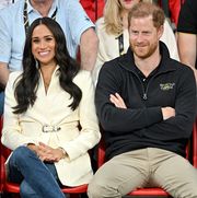 the hague, netherlands   april 17 prince harry, duke of sussex and meghan, duchess of sussex attend the volleyball on day two of the invictus games 2020 at zuiderpark on april 17, 2022 in the hague, netherlands photo by samir husseinwireimage