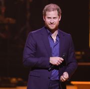 the hague, netherlands   april 22 prince harry, duke of sussex speaks on stage during the invictus games the hague 2020 closing ceremony at zuiderpark on april 22, 2022 in the hague, netherlands photo by chris jacksongetty images for the invictus games foundation