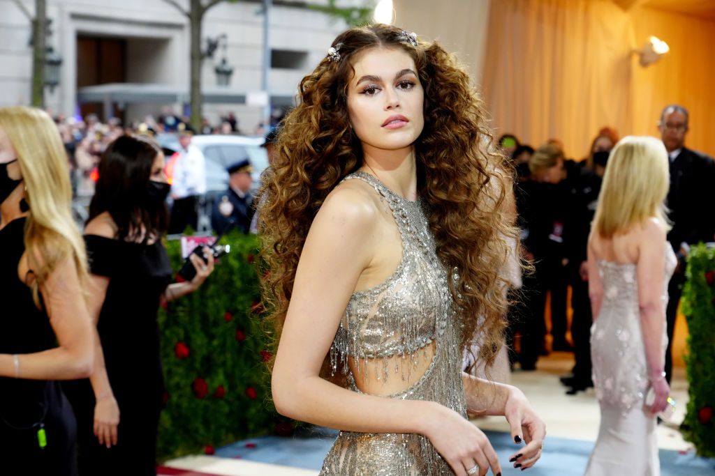 Kaia Gerber Wears a Sheer Metallic Cut-Out Dress to the 2022 Met Gala