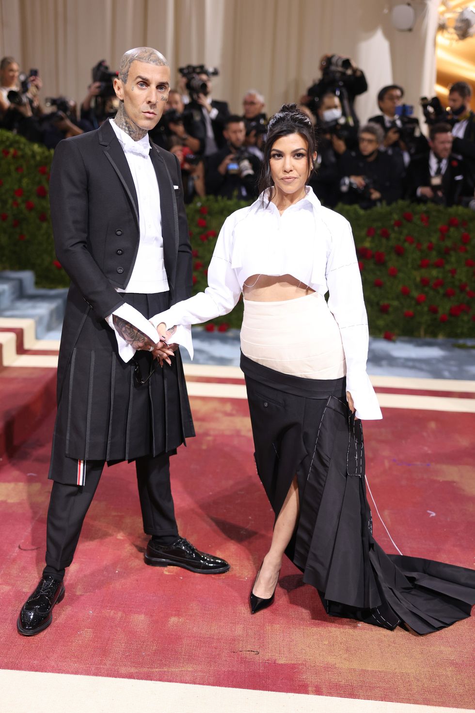 new york, new york   may 02 l r travis barker and kourtney kardashian attends the 2022 met gala celebrating "in america an anthology of fashion" at the metropolitan museum of art on may 02, 2022 in new york city photo by john shearergetty images