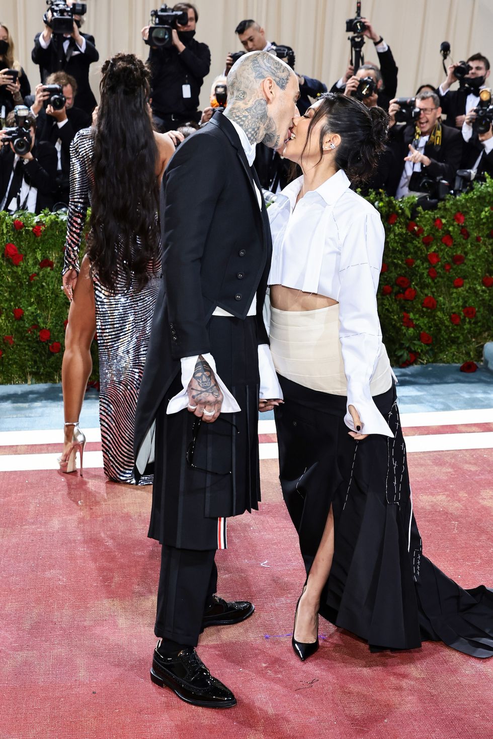 new york, new york   may 02 l r travis barker and kourtney kardashian attend the 2022 met gala celebrating "in america an anthology of fashion" at the metropolitan museum of art on may 02, 2022 in new york city photo by jamie mccarthygetty images