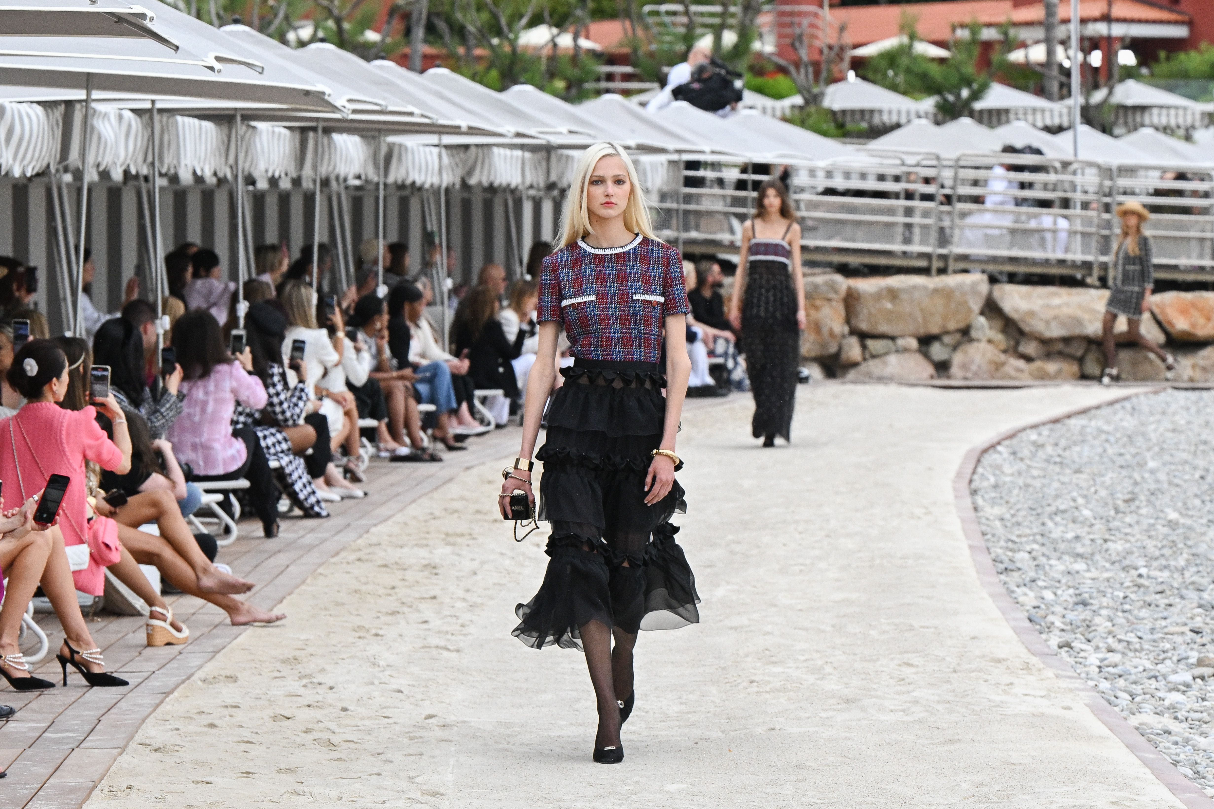 Inside Chanel's star-studded cruise fashion show in Los Angeles: Virginie  Viard's 2023/24 runway brought Californian sporty vibes, with Snoop Dogg  performing and guests from Margot Robbie to Lil Nas X