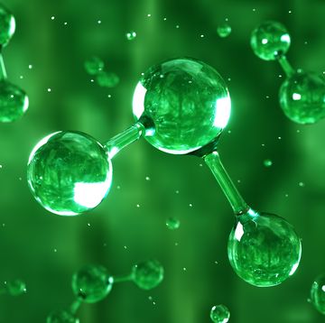 digital generated image of h2 hydrogen molecule made out of liquid on green background