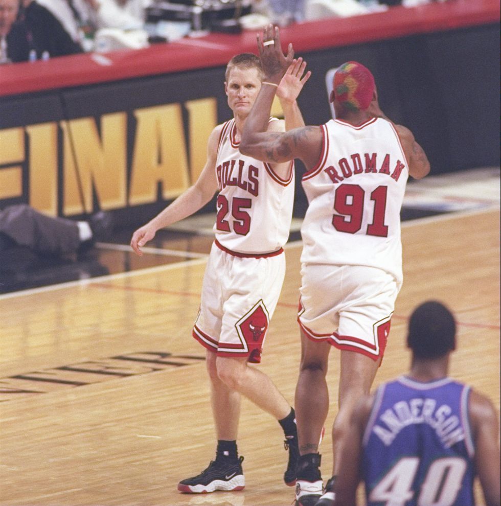13 jun 1997 guard shandon anderson of the utah jazz watches as guard steve kerr 25 and forward dennis rodman 91 of the chicago bulls high five each other during game 6 of the 1997 nba finals at the united center in chicago, illinois the bulls defeated the jazz 90 86 to win the series and claim the championship
