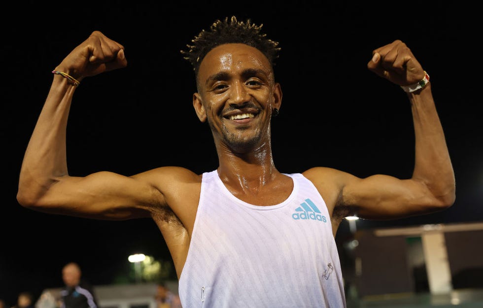 london, england may 14 yemaneberhan crippa celebrates winning the race 10 the mens uka 10,000m champs during the night of the 10,000m pbs at parliament hill athletics track on may 14, 2022 in london, england photo by matt lewis british athleticsbritish athletics via getty images