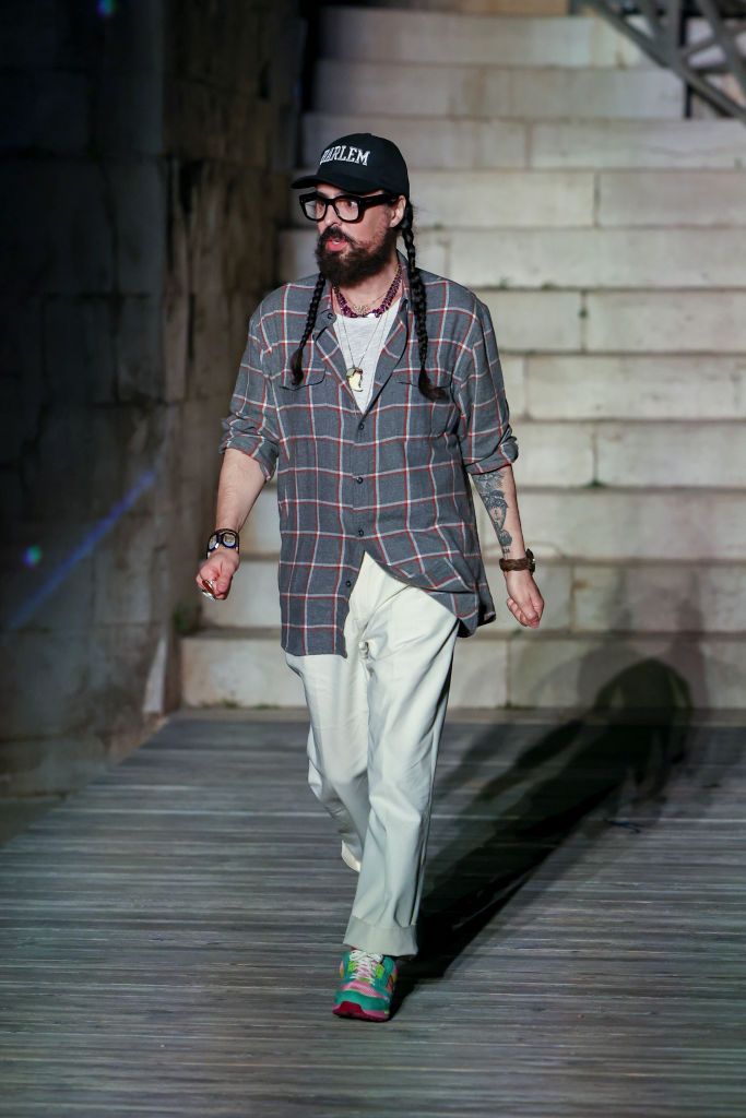 castel del monte, italy may 16 designer alessandro michele aknowledges the applause of the public during gucci cosmogonie at castel del monte on may 16, 2022 in andria, italy photo by daniele venturelligetty images for gucci