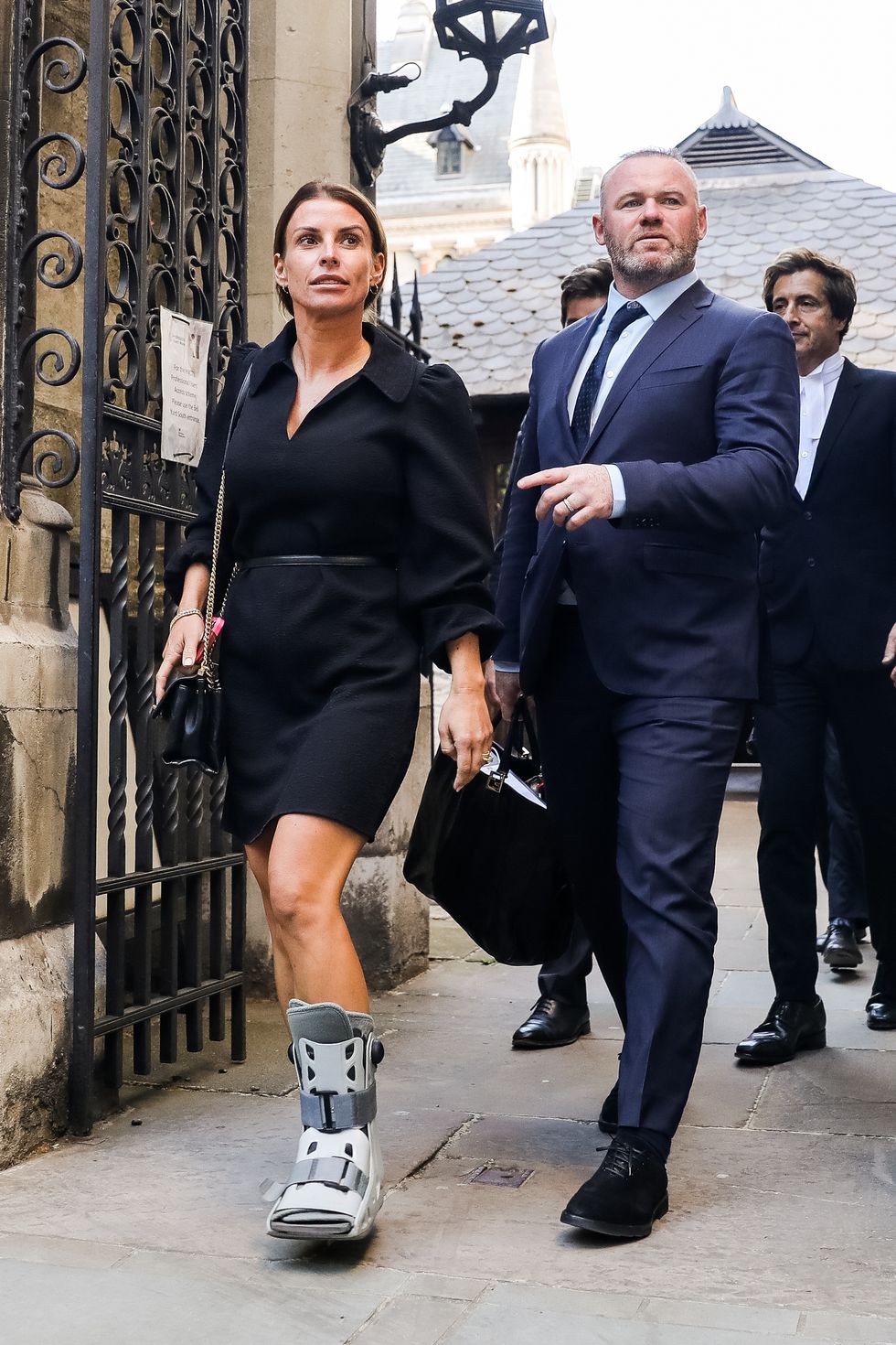 london, england may 17 coleen rooney and wayne rooney leave the royal courts of justice, strand on may 17, 2022 in london, england coleen rooney, wife derby county manager wayne rooney, and rebekah vardy, wife of leicester city striker jamie vardy, are locked in a libel battle dubbed by the media as the wagatha christie trial the case centres around accusations that mrs vardy leaked false stories about mrs rooneys private life to the press photo by tristan fewingsgetty images