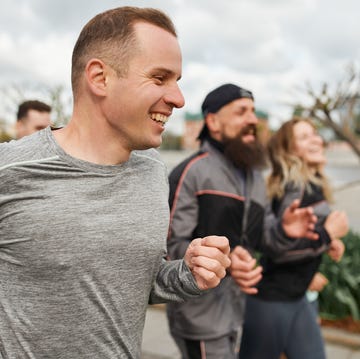 Running with friends group of individuals running in an outdoor setting