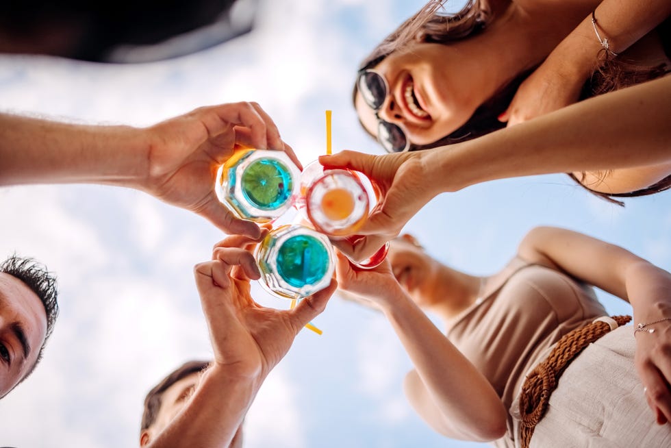 keep drinks cool insulated cups friends cheering with cups