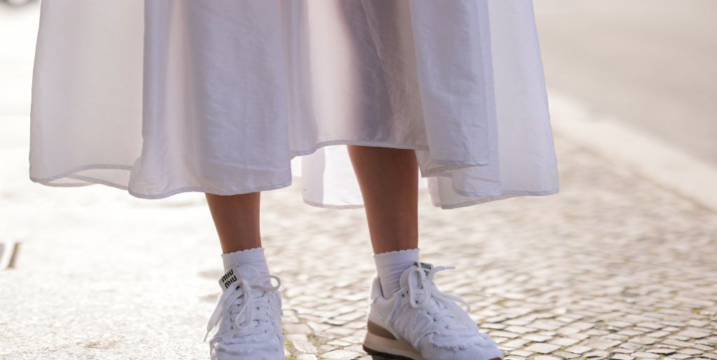 berlin, germany may 31 lena naumann wearing new balance x miu miu white sneaker, cecilie bahnsen white maxi dress on may 31, 2022 in berlin, germany photo by jeremy moellergetty images