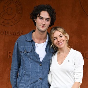 paris, france june 03 oli green and sienna miller attend the french open 2022 at roland garros on june 03, 2022 in paris, france photo by stephane cardinale corbiscorbis via getty images