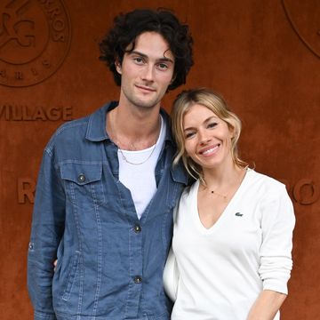 paris, france june 03 oli green and sienna miller attend the french open 2022 at roland garros on june 03, 2022 in paris, france photo by stephane cardinale corbiscorbis via getty images