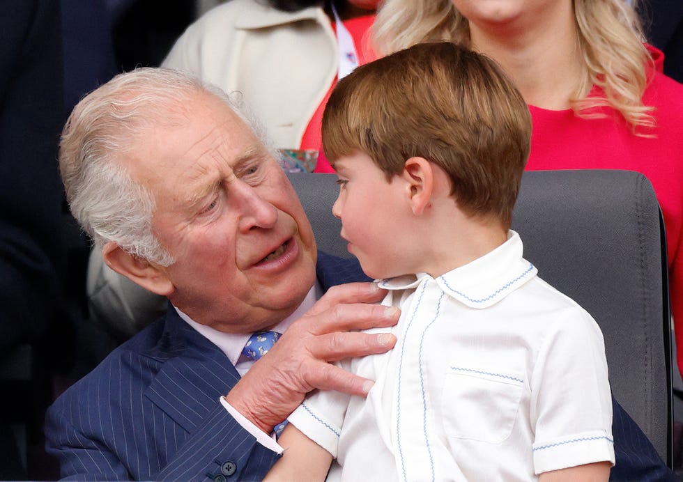 london, united kingdom june 05: (embargoed for publication in uk newspapers until 24 hours after create date and time) prince louis of cambridge sits on his grandfather prince charles, prince of waless lap as they attend the platinum pageant on the mall on june 5, 2022 in london, england. the platinum jubilee of elizabeth ii is being celebrated from june 2 to june 5, 2022, in the uk and commonwealth to mark the 70th anniversary of the accession of queen elizabeth ii on 6 february 1952. (photo by max mumby/indigo/getty images)