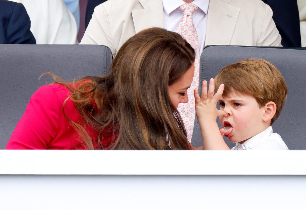 london, united kingdom june 05 embargoed for publication in uk newspapers until 24 hours after create date and time prince louis of cambridge thumbs his nose and sticks his tongue out at his mother catherine, duchess of cambridge as they attend the platinum pageant on the mall on june 5, 2022 in london, england the platinum jubilee of elizabeth ii is being celebrated from june 2 to june 5, 2022, in the uk and commonwealth to mark the 70th anniversary of the accession of queen elizabeth ii on 6 february 1952 photo by max mumbyindigogetty images