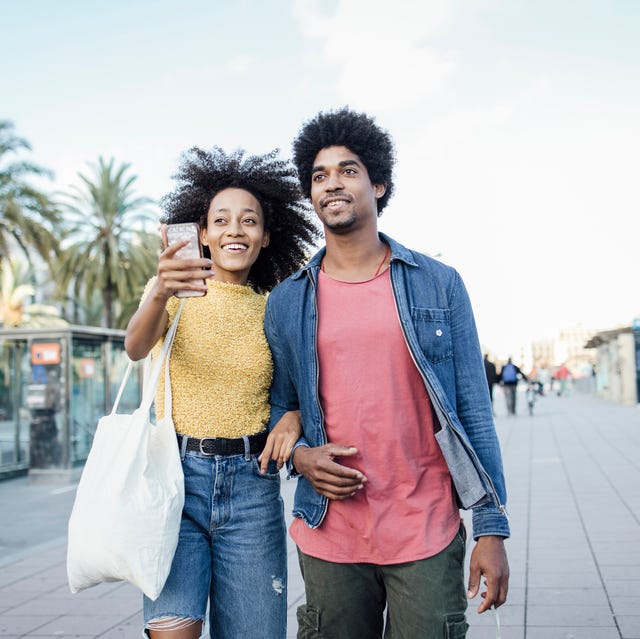 young african american couple on vacation exploring