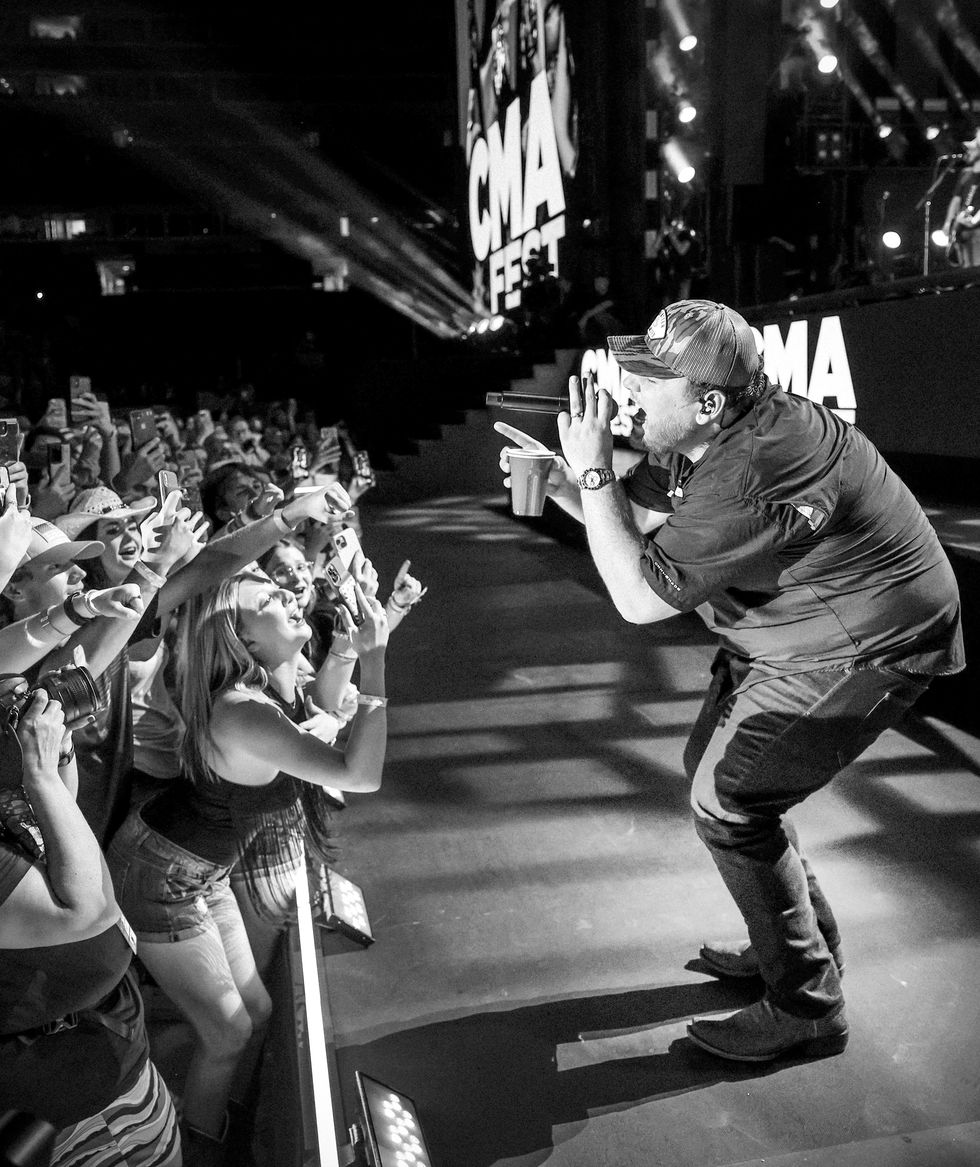 nashville, tennessee june 11 editors note image has been converted to black white color image is available luke combs performs during day 3 of cma fest 2022 at nissan stadium on june 11, 2022 in nashville, tennessee photo by jason kempingetty images