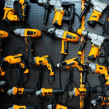 Many electric drills on the shelf many electric drills on the shelf