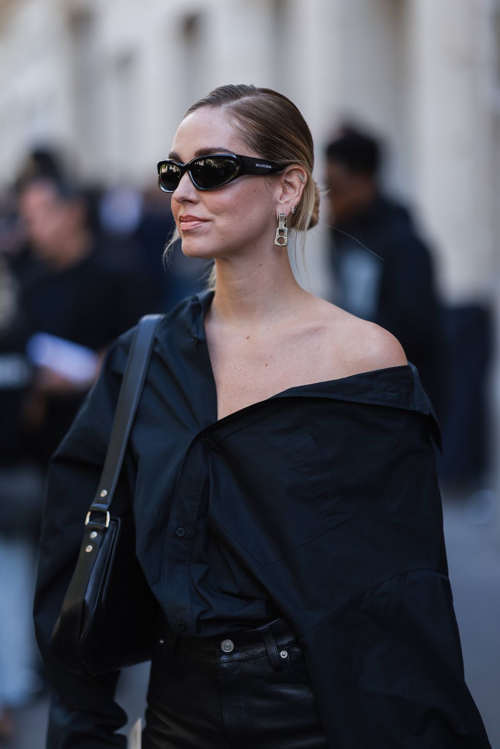 paris, france july 06 chiara ferragni seen wearing silver pendant earrings from balenciaga, black sunglasses from balenciaga, a black oversized shirt, a black leather large pants from balenciaga and a black leather balenciaga shoulder bag, outside the balenciaga show, during paris fashion week haute couture fall winter 2022 2023, on july 06, 2022 in paris, france photo by jeremy moellergetty images