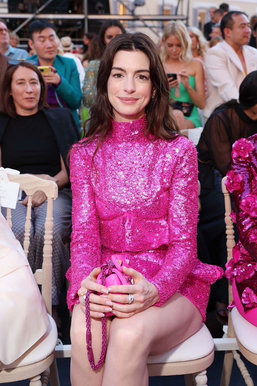 a person in a pink dress