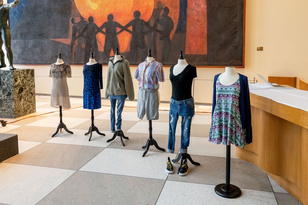 outfits worn by survivors of sexual violence on display at the "what were you wearing" by rise exhibit at united nations on july 11, 2022 in new york city
