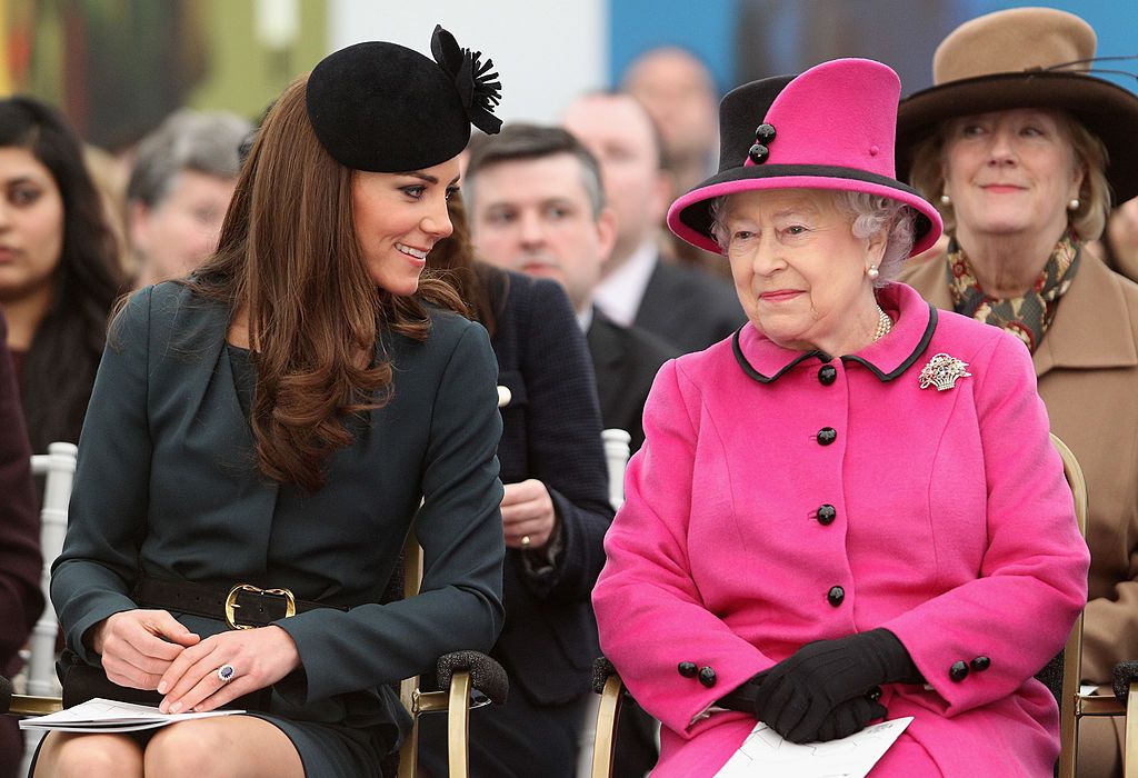 leicester, england   march 08  queen elizabeth ii r and catherine, duchess of cambridge l watch a fashion show at de montfort university on march 8, 2012 in leicester, england the royal visit to leicester marks the first date of queen elizabeth iis diamond jubilee tour of the uk between march 8 and july 25, 2012  photo by oli scarff   wpa pool  getty images