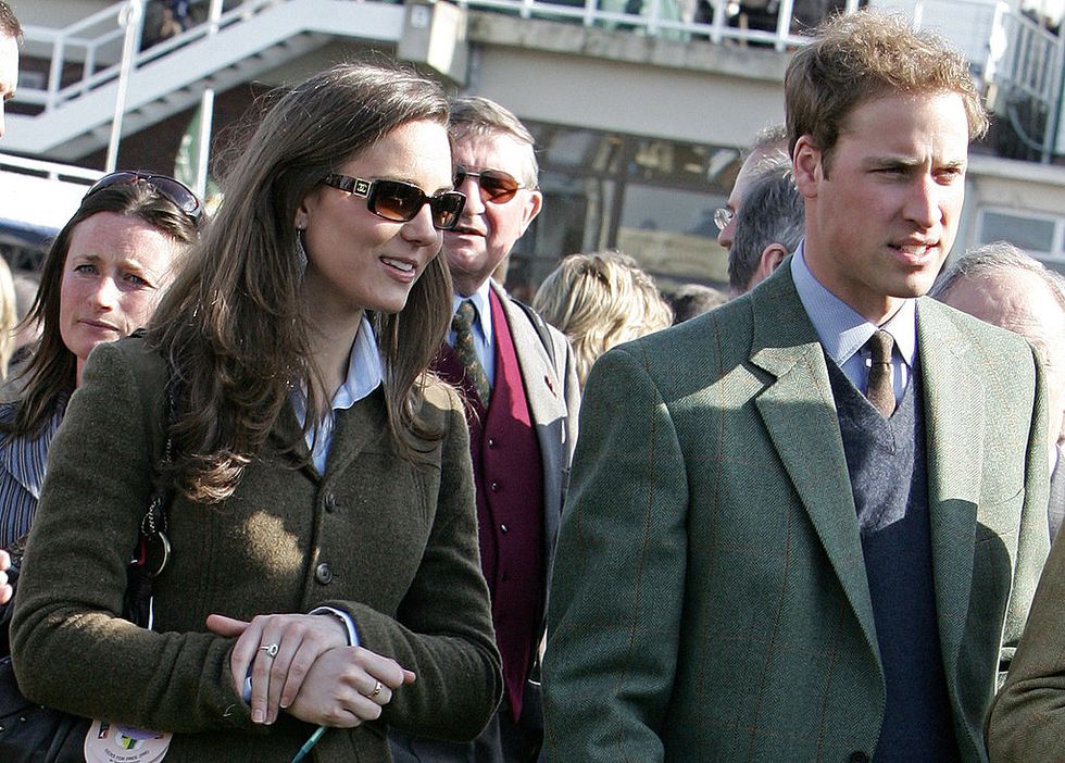 britains prince william r stands beside girlfriend kate middleton l in the paddock enclosure on the first day of the cheltenham race festival at cheltenham race course, in gloucestershire 13 march 2007 photo credit should read carl de souzaafp via getty images