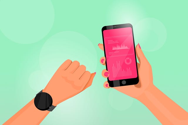 persons arm with apple watch holding fitness app