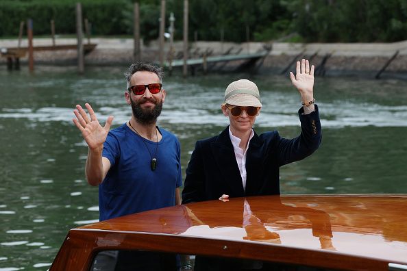 venice, italy september 08 sandro kopp and tilda swinton leave the hotel excelsior during the 79th venice international film festival on september 08, 2022 in venice, italy photo by pascal le segretaingetty images