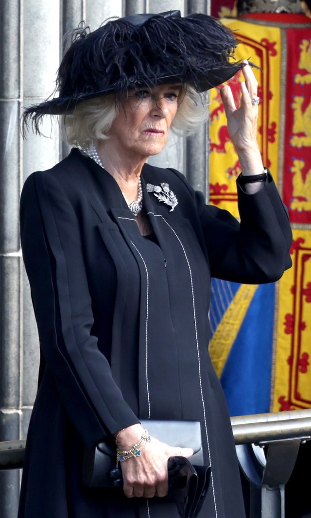 How Queen Camilla Is Carrying Queen Elizabeth's Style Legacy — Literally! —  with Her Own Twist