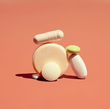 a group of pharmaceutical drugs pills laid in a pile