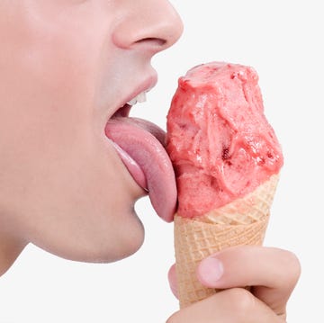 Close-up of a man licking an ice cream